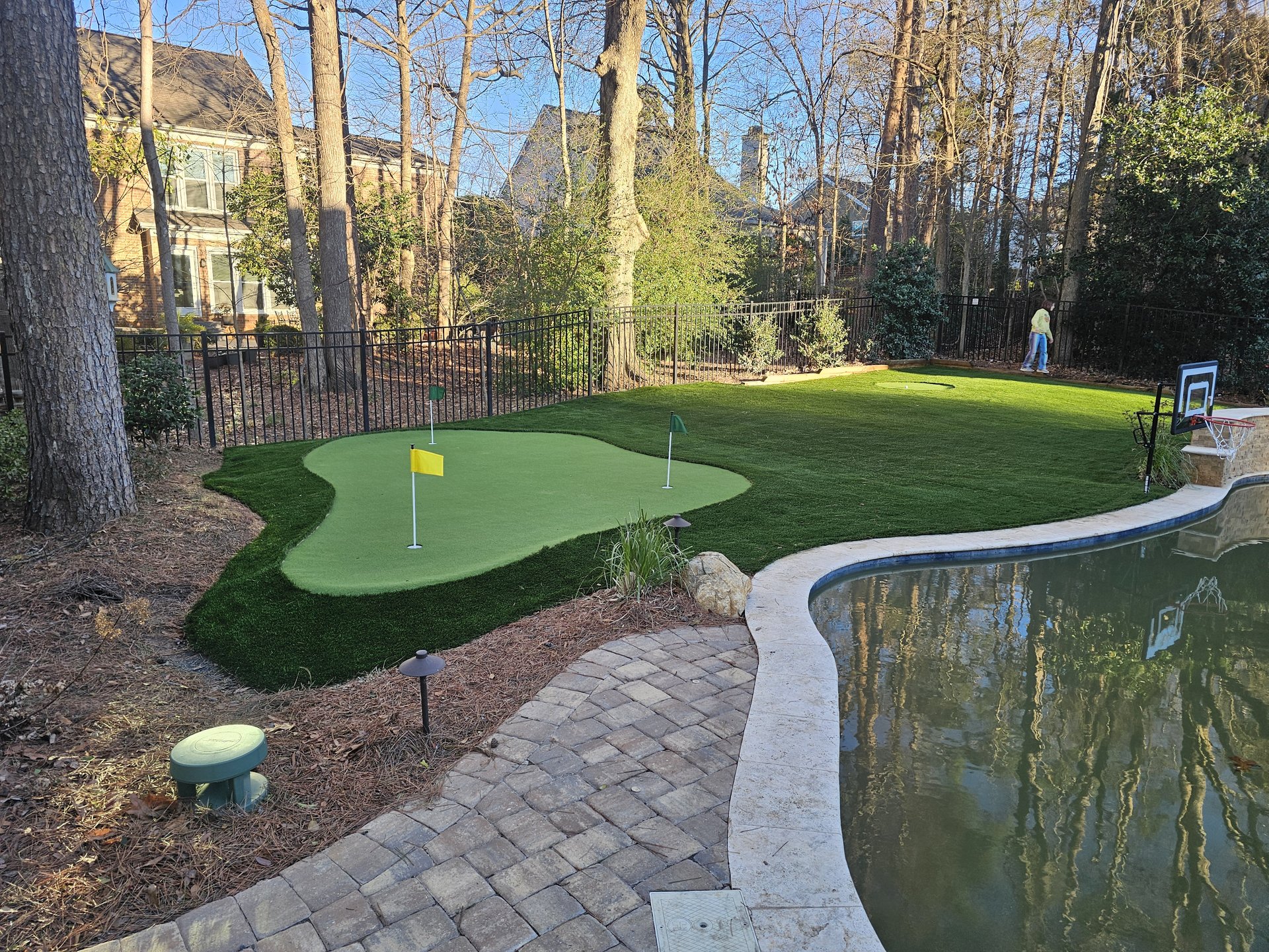 Joshua Keller 54 artificial yard miniature golf course by pool
